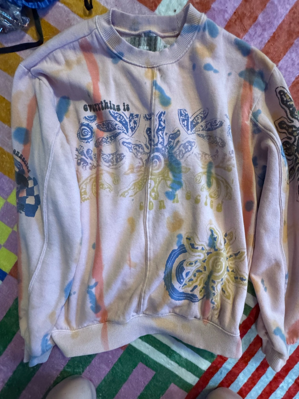 Urban Outfitters Womenโs Pink Tie-Dye Graphic sweatshirt